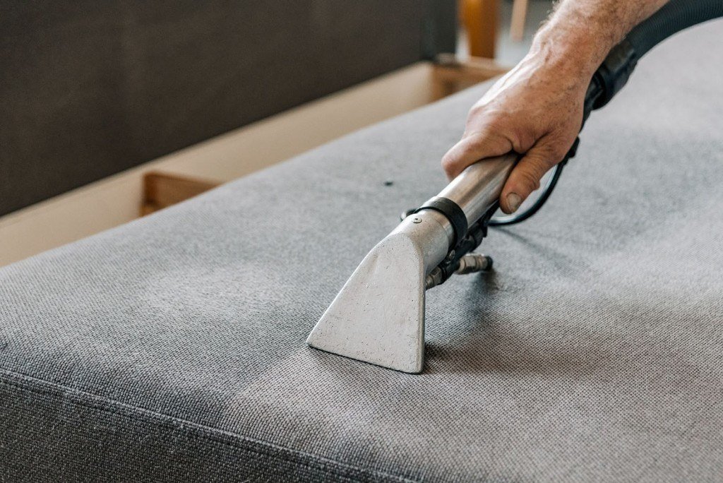 Upholstery cleaning on a sofa
